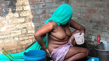 Desi Radhika’s Steamy Village Bathing Scene In Hindi